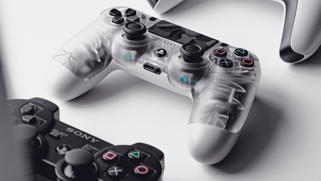 PlayStation controllers representing GTA VI PS5 buying considerations